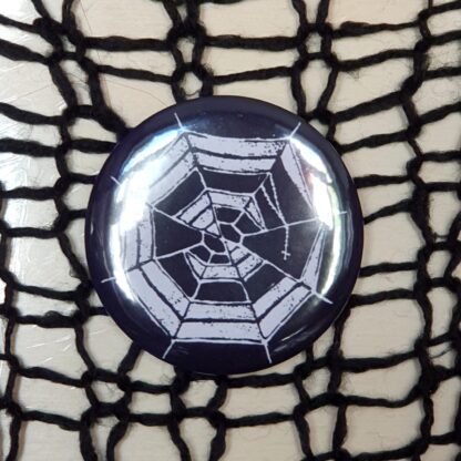 Catholic Spit 58mm button - Spiderweb logo